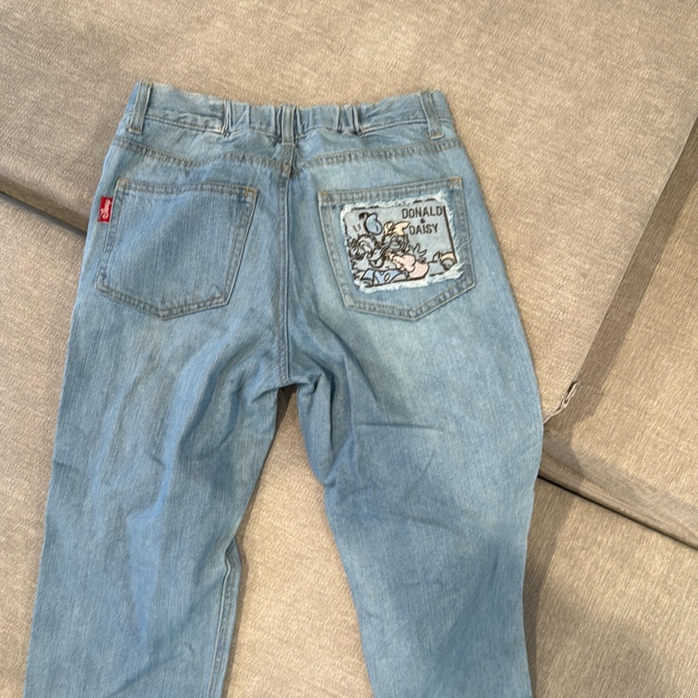 Disney women’s size small blue jeans, Donald and Daisy edition from Japan Disney